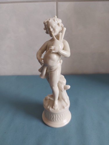 Porzellanfigur putte mit - porzellanfigur-~putte,