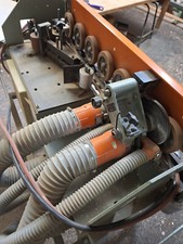 Kantenleimmaschine  von HOLZ HER, verputzt und längt ab