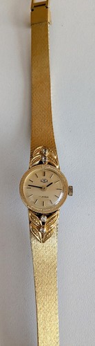 Wenig getragene goldfarbene - wenig, getragene,