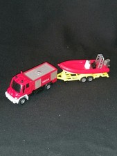 Modellauto SIKU, Unimog U 400, Feuerwehr mit Rettungsboot, 1:87, bespielt