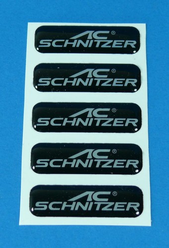 Schnitzer emblem vitro - ac,