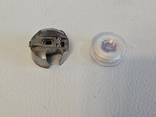 Spulenkapsel mit Spüle für