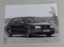Pressefoto VW Golf 3 / III vor Blumenwiese von 08/1991
