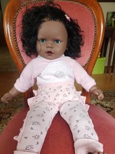 Große Spielpuppe, farbig,  65 cm groß mit geraden Beinen