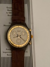 SWATCH CHRONO GOLDFINGER SCM