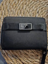 George Gina & Lucy Portmonee