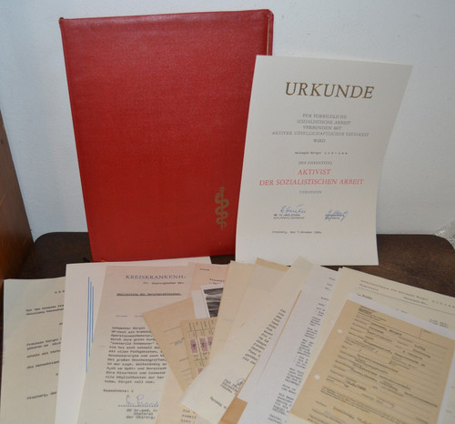 Ddr mappe mit urkunden - ddr-mappe, und