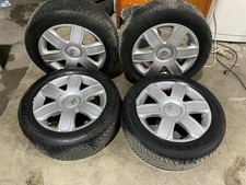 4 Winterreifen 205 55 R16 16" inkl. Opel Stahlfelgen mit Radkappen