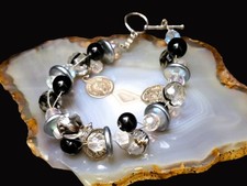 Armband Edelstahl Münzen Glasperlen klar schwarz attraktive Mischung 22,5cm 35g