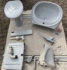 Gebrauchtes Duravit Waschbecken + Toilette und Spülkasten (Farbe grau)