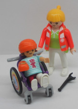 Kind im Rollstuhl Zubehör +