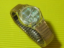 Swatch GLITTER mit goldfarbenem Flexarmband in NEU aber OHNE Schachtel