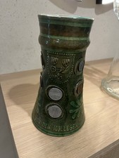 Krug mit antiken Münzen