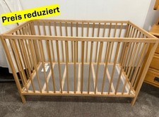 Babybett und Matratze