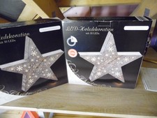 Fensterdeko 2 Holzsterne  mit je 10 LEDs und Timer