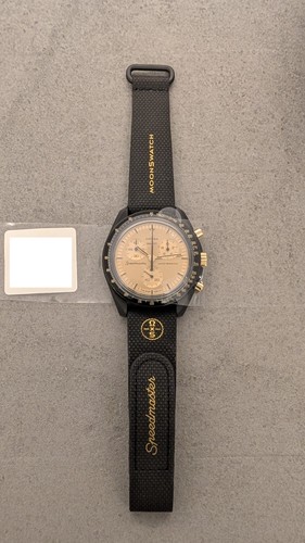 Swatch omega mission the - x,