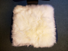 Sitzauflage aus echtem Schaffell Lammfell Farbe naturweiß ca. 42cm x 42cm