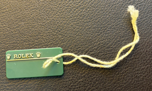 Orig rolex hang - orig., tag