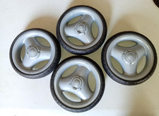 4 alte Kinderwagenräder Vollgummi