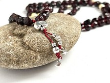 Malakette Handgeknotet