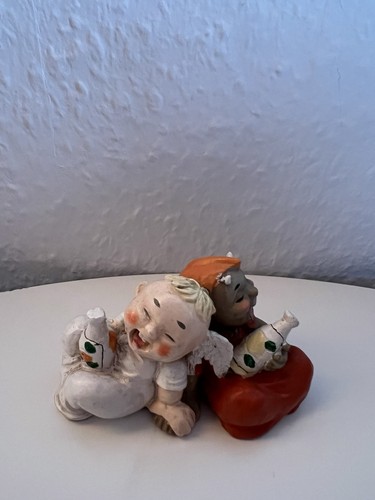 Kleine figur engel und teufel - engel,