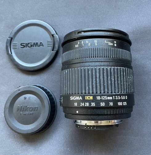 Sigma objektiv 125 - dc, mm