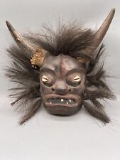 Afrikan grimassieren  Dämon