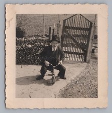 Mann auf Dreirad - Altes Foto