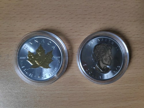 Unze maple leaf - 1,