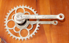 Tretlagerwelle + Zahnkranz +