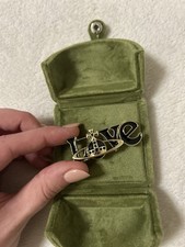 Love Brosche Gold Schwarz VW