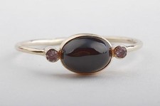 Ring mit schwarzem Stein