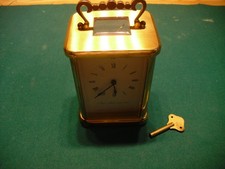 tischuhr mechanisch messing