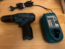 Makita Akkuschrauber HP330D / Neuer  Akku Ladegerät DC10WA