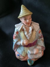 Figur Wackelkopf sitzender