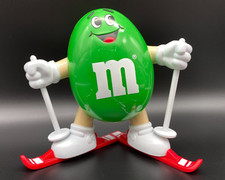 M&M Figur Spender Ski grün