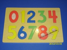 Holzpuzzle Zahlen 0 - 9