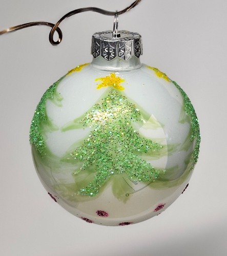 Christmas ball glass hand