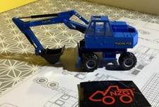 NZG Fuchs Bagger in Maßstab 1:50.