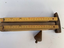 Senklot mit Hammer und