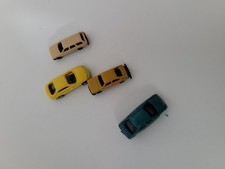 9 Modellautos plus Ersatzteile