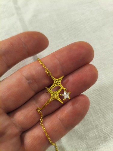 Goldfarbenes stern collier mit - stern,