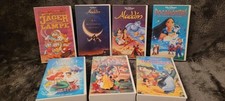 Sieben Disney VHS Kassetten