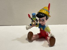 Disney Pinocchio Figur Applause 90er Jahre Vintage sitzend mit Jiminy Grille