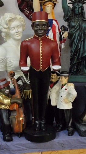 Black boy hotelpage diener - boy,