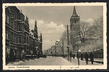Ansichtskarte Gnesen, Winterliche Partie in der Friedrichstraße 