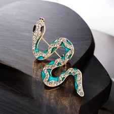 Goldene Schlangen-Brosche mit