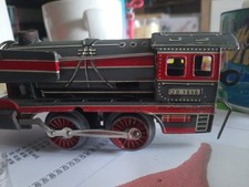 Distler Lok mit Anhänger und Schienen