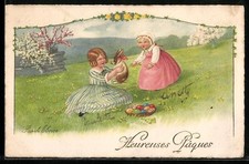Künstler-AK Pauli Ebner: Zwei Mädchen mit Osterhasen auf einer Wiese 
