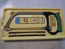 Bügelsäge/Pucksäge, mit Ersatzblättern in orig. VP